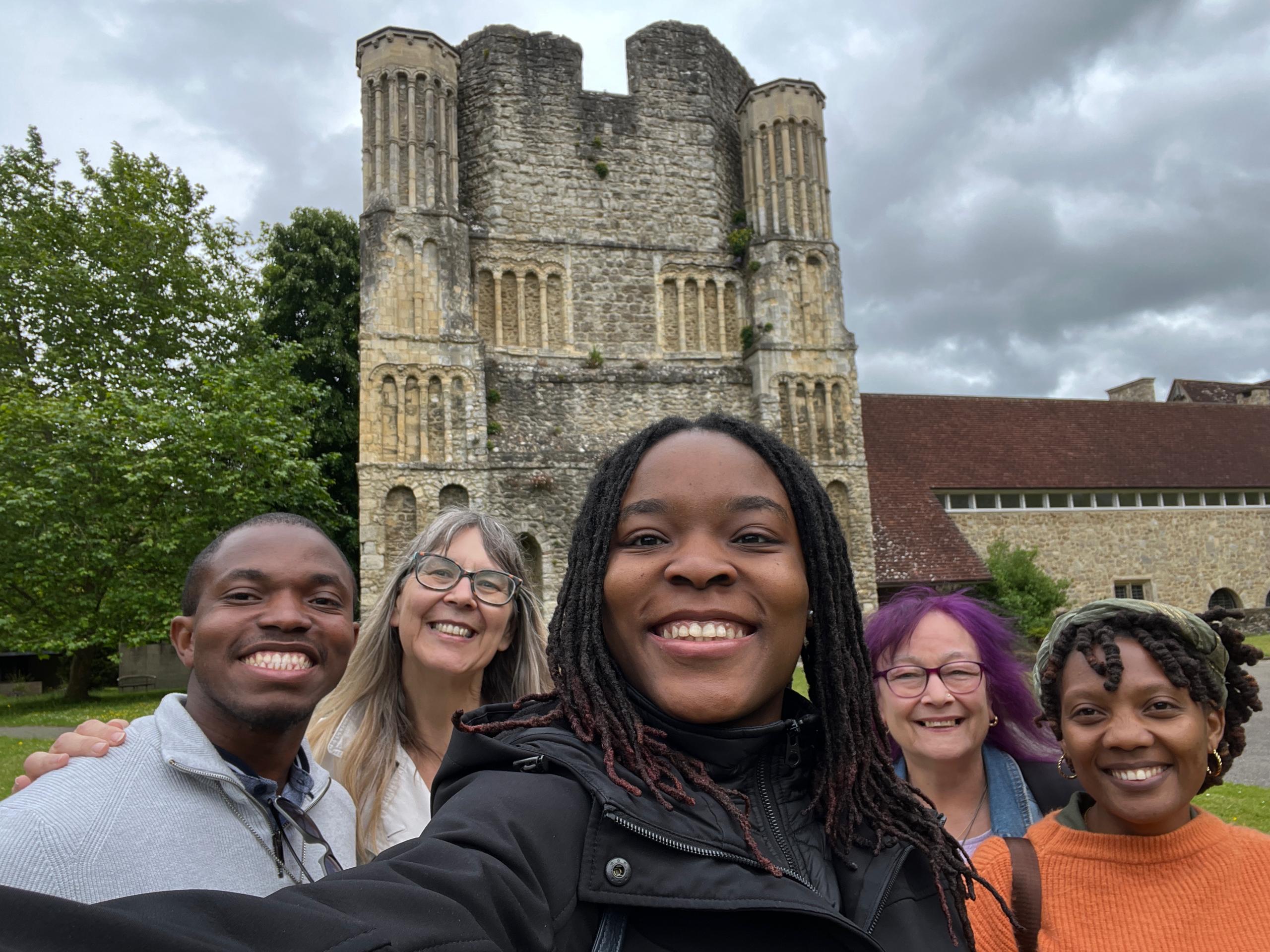 Students take a selfie in front of Abbey