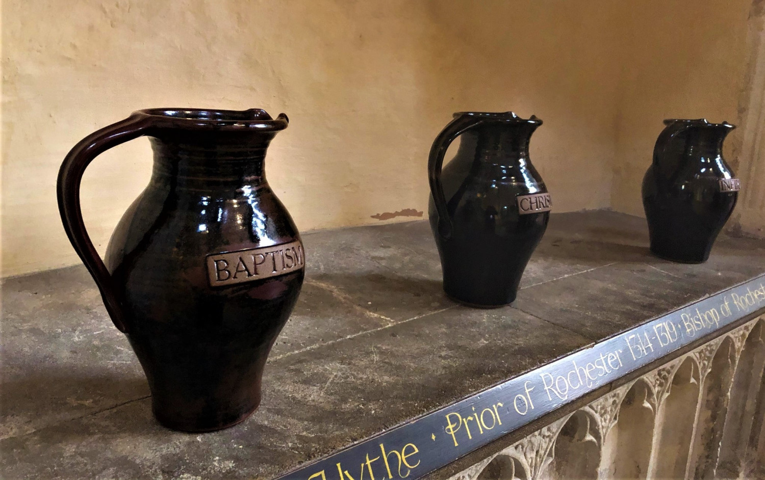 Three jars of oil at Rochester Cathedral 