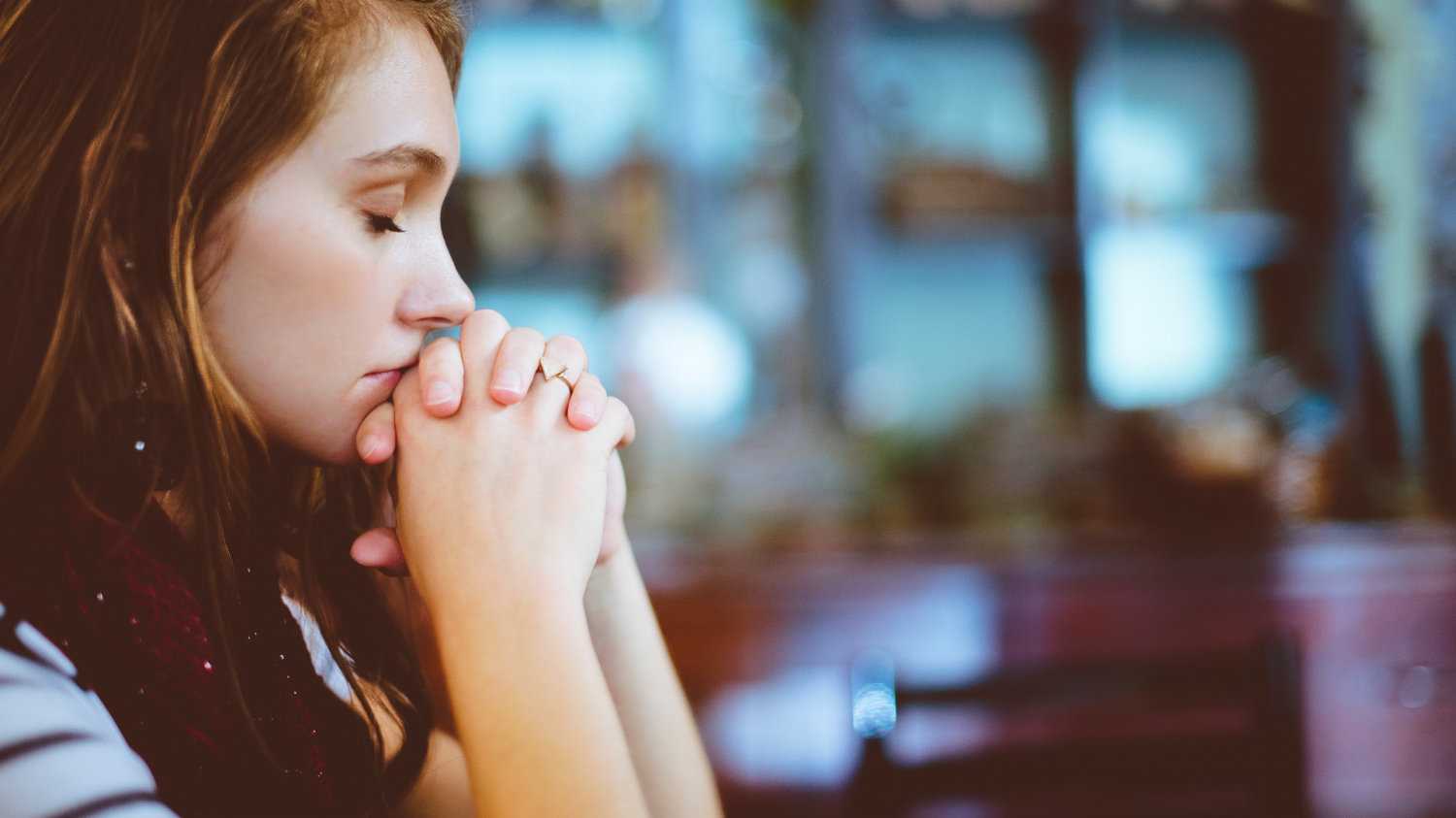 Young woman praying